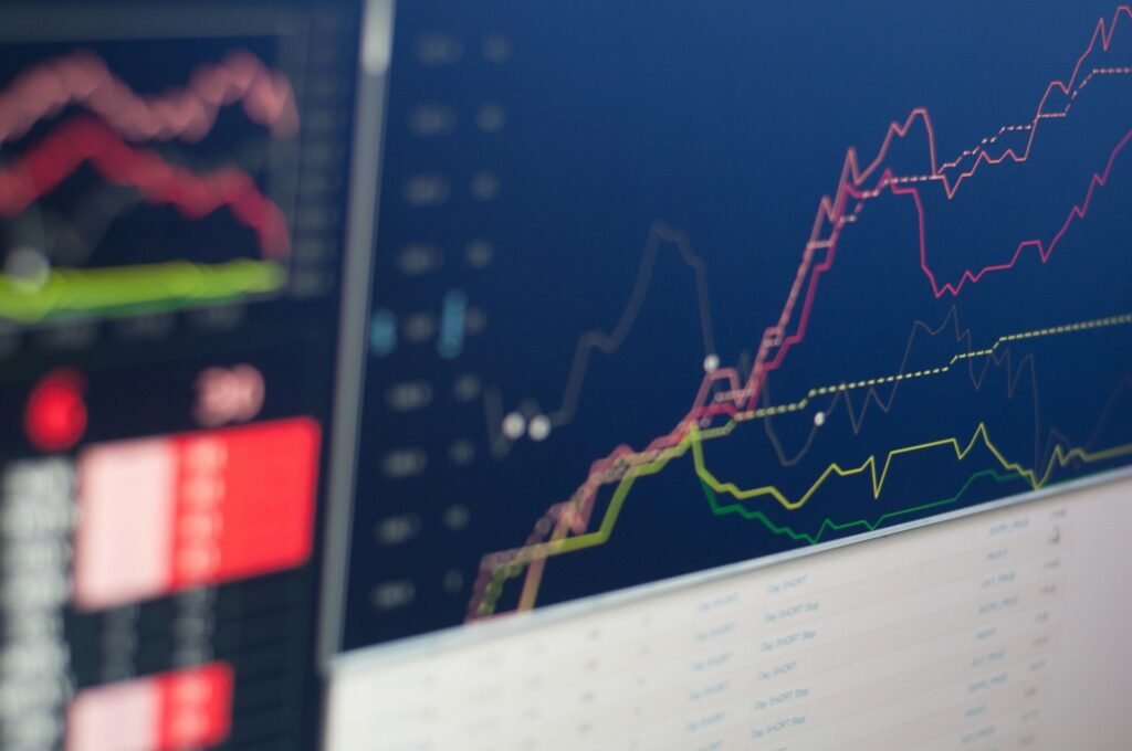 Monitor displaying stock charts during a live trading session
